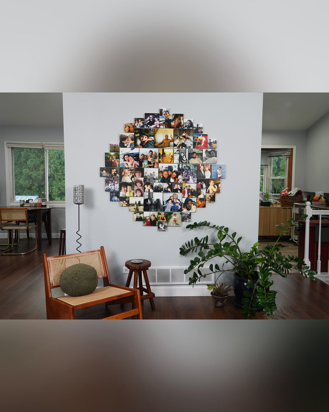 About sixty small wood photo blocks arranged in a filled circle on a dining room wall