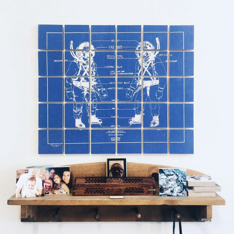 A customer photo wall of Shiner wood blocks